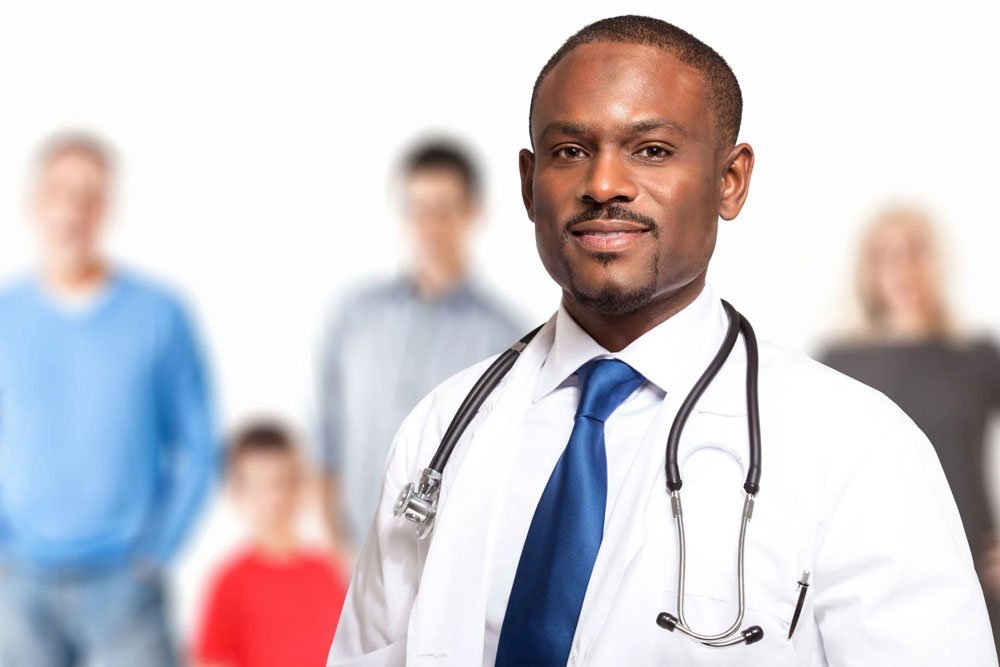 Doctor wearing a white coat and stethoscope